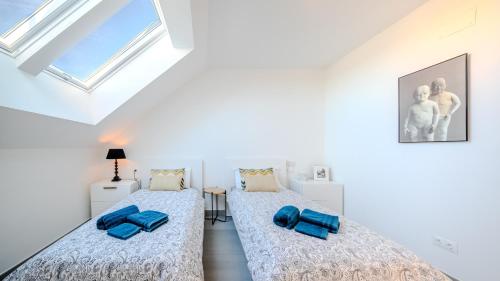 Ένα ή περισσότερα κρεβάτια σε δωμάτιο στο AticoBLU