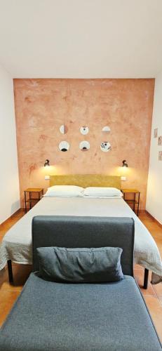 Postel nebo postele na pokoji v ubytování Aba Maya Guesthouse Alghero
