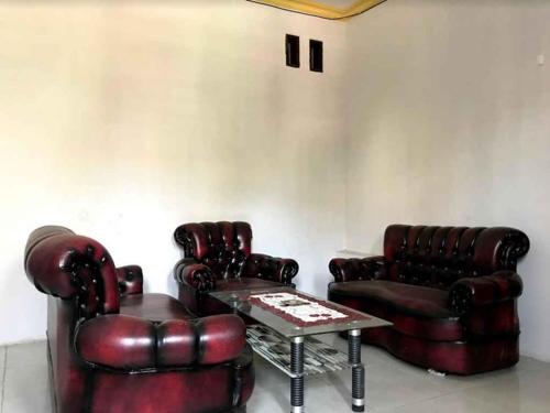 Posezení v ubytování Penginapan Dillah HO