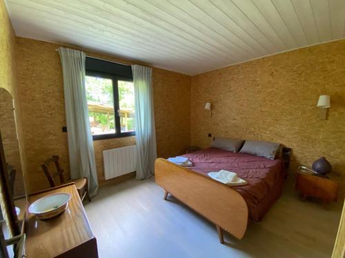 Ένα ή περισσότερα κρεβάτια σε δωμάτιο στο La Comtesse