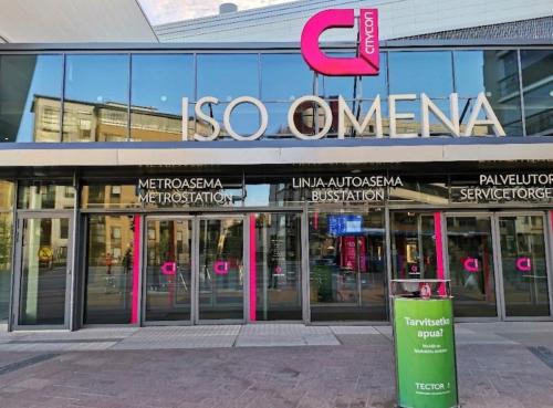a store front of a building with a sign on it at A great apartment for daily or weekly rent 60m in Espoo