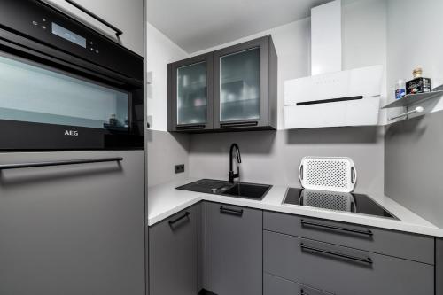 Kuchyň nebo kuchyňský kout v ubytování Feel-good apartment with balcony - quiet and central