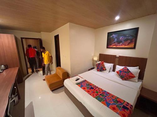 Ένα ή περισσότερα κρεβάτια σε δωμάτιο στο Hotel O Casa Royal Residency