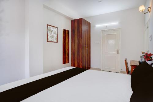 Postel nebo postele na pokoji v ubytování Hotel O La Vita Oasis