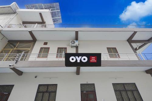 Certifikát, hodnocení, plakát nebo jiný dokument vystavený v ubytování Hotel O Neeta Homestay