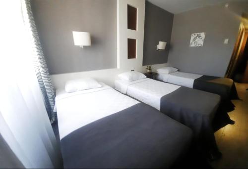 Postel nebo postele na pokoji v ubytování Dedepark Hotel