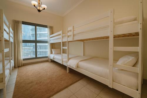 Кровать или кровати в номере TravelTime Marina