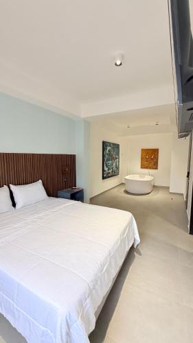 Ένα ή περισσότερα κρεβάτια σε δωμάτιο στο Hotel Gallery Boutique