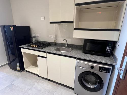 Η κουζίνα ή μικρή κουζίνα στο Tower Studio