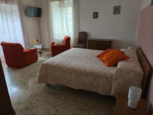 Ένα ή περισσότερα κρεβάτια σε δωμάτιο στο Casa Civitas