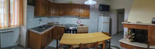 Kuchyň nebo kuchyňský kout v ubytování Casa Civitas