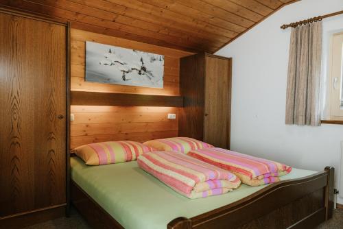 Кровать или кровати в номере Almblick Appartements