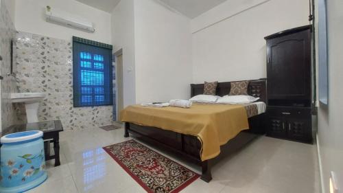 Ένα ή περισσότερα κρεβάτια σε δωμάτιο στο White Palace