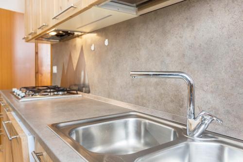 Η κουζίνα ή μικρή κουζίνα στο Appartamento Borésc