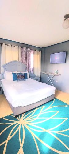 Postel nebo postele na pokoji v ubytování Central Paradise Vacation Rental