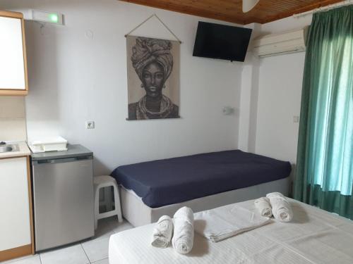 Ένα ή περισσότερα κρεβάτια σε δωμάτιο στο Νέηλυς