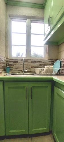 Kuchyň nebo kuchyňský kout v ubytování Central Paradise Vacation Rental