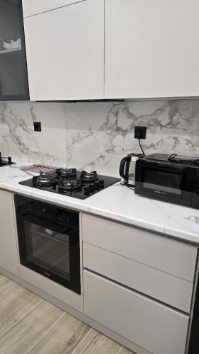 Η κουζίνα ή μικρή κουζίνα στο Apartment in Borjomi