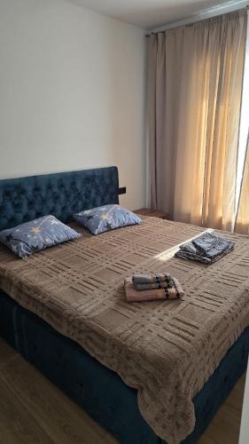 Ένα ή περισσότερα κρεβάτια σε δωμάτιο στο Apartment in Borjomi