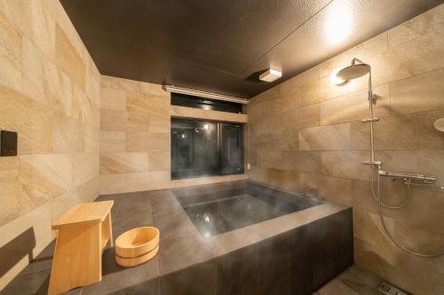 Koupelna v ubytování OnsenSauna Villa Jozankei Yuk