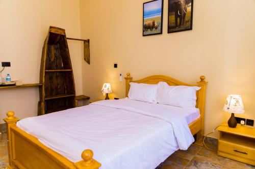 Postel nebo postele na pokoji v ubytování Lastanza Safari Lodge