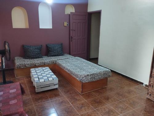 Postel nebo postele na pokoji v ubytování Auberge Côté Plage - Ex Pélican