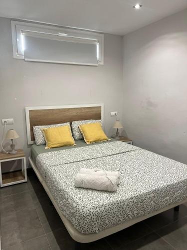 Ένα ή περισσότερα κρεβάτια σε δωμάτιο στο Modern apartment in Part Alta