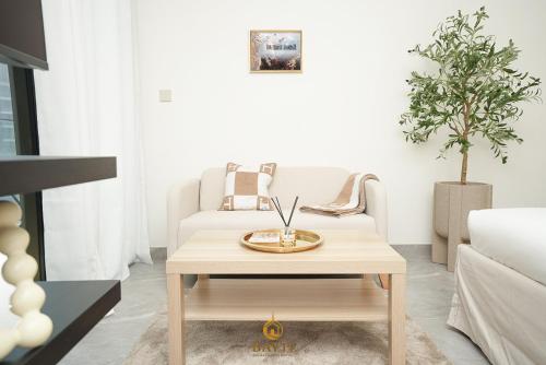 Posezení v ubytování Evasion Moderne a Business Bay vue sur le canal