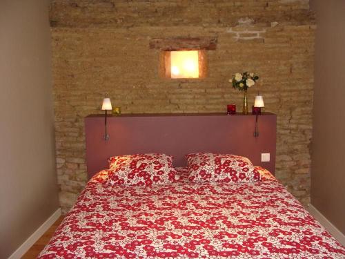 Ένα ή περισσότερα κρεβάτια σε δωμάτιο στο Gîte "Le Ramounel"