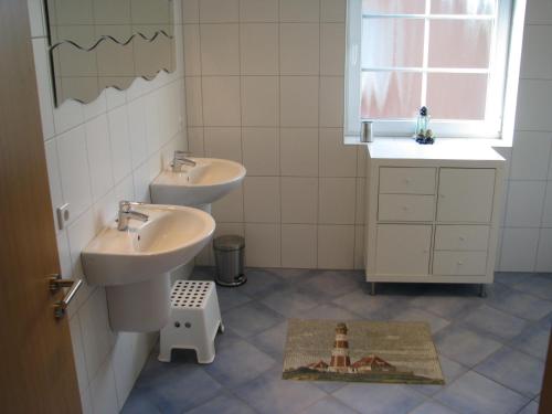 Vannituba majutusasutuses Ferienhaus Süderhus Nordstrand