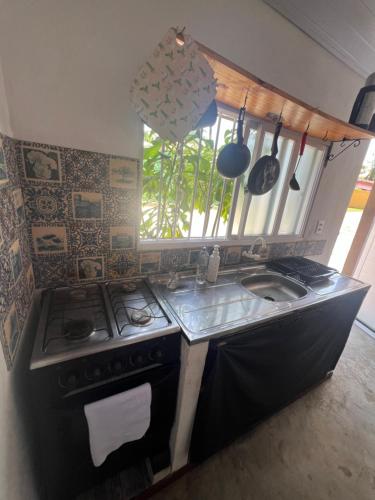 O bucătărie sau chicinetă la Casa Kuki's