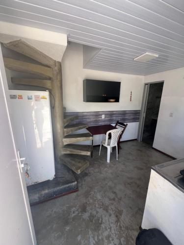 Un televizor și/sau centru de divertisment la Casa Kuki's