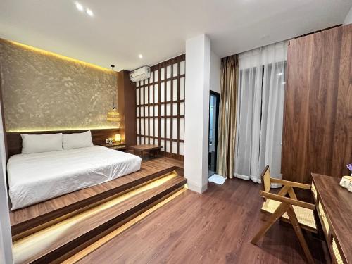 Postel nebo postele na pokoji v ubytování Nana Villa Hue