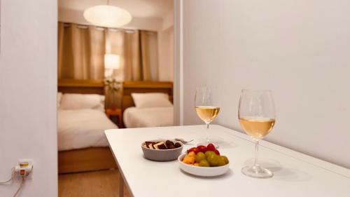 Voodi või voodid majutusasutuse Exit 4 of Hongik University toas