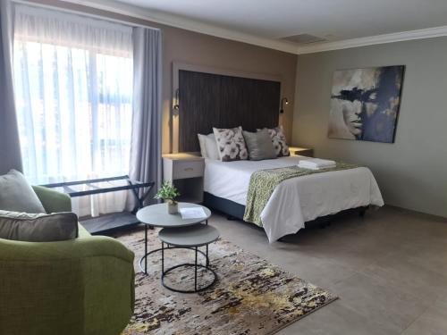 Postel nebo postele na pokoji v ubytování Silvakruin Guest House