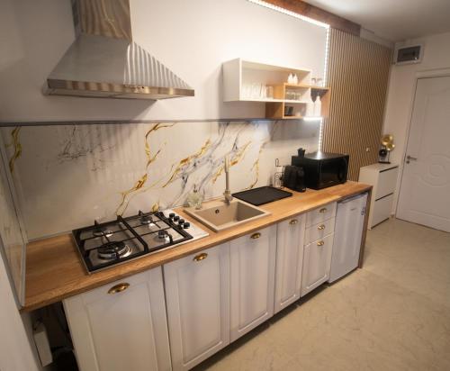 Η κουζίνα ή μικρή κουζίνα στο Magnolia Loft