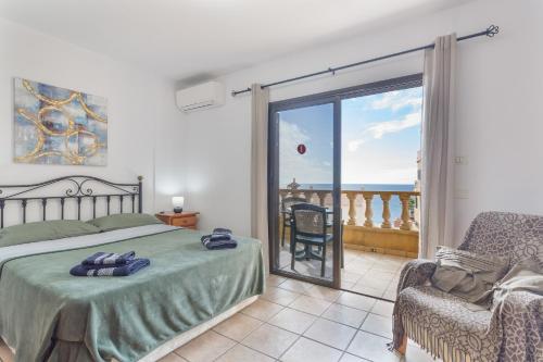 Ένα ή περισσότερα κρεβάτια σε δωμάτιο στο Los Azahares Apartment