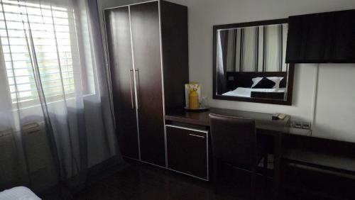 Ένα ή περισσότερα κρεβάτια σε δωμάτιο στο Hotel Rio