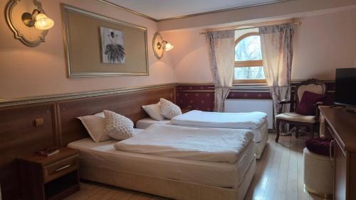 Ένα ή περισσότερα κρεβάτια σε δωμάτιο στο Hotel Rio