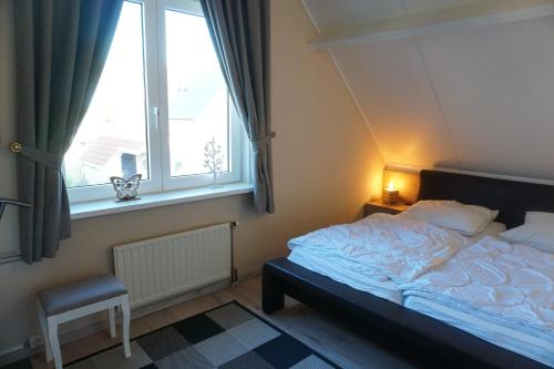 En eller flere senge i et værelse på Kustverhuur, Park Scheldeveste, Zwin 057