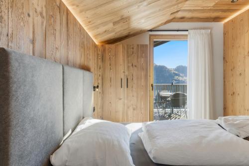 Ένα ή περισσότερα κρεβάτια σε δωμάτιο στο Dickerhof - Urlaub auf dem Bauernhof