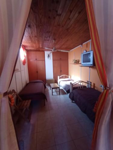 Postel nebo postele na pokoji v ubytování Departamento familiar