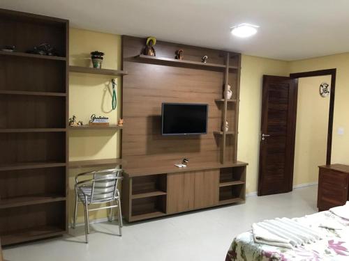 TV a/nebo společenská místnost v ubytování AP 104 - Flecheiras Residence