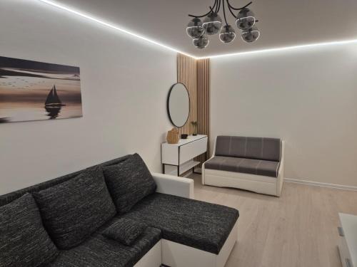 Χώρος καθιστικού στο Pilsētas sirds apartamenti