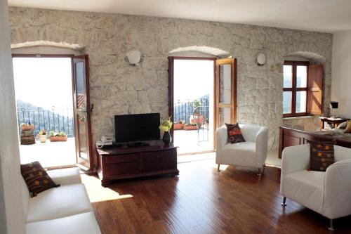 TV a/nebo společenská místnost v ubytování Villa Kapetan In Srida Sela Mit Panoramablick