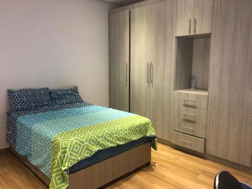 En eller flere senge i et værelse på 416 Beach house