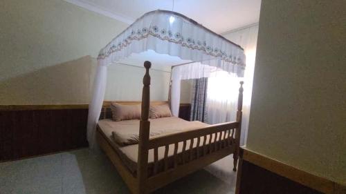 Ένα ή περισσότερα κρεβάτια σε δωμάτιο στο Jinas Haven