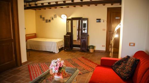 Giường trong phòng chung tại Appartamento Cerato