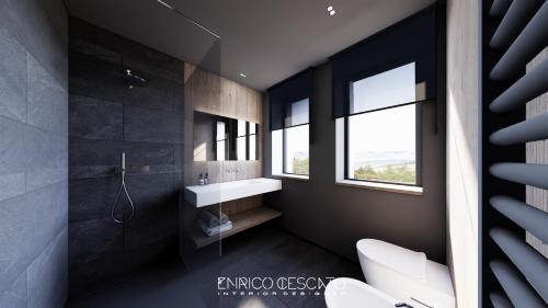 Phòng tắm tại La Dane Zoncolan aparthotel & spa