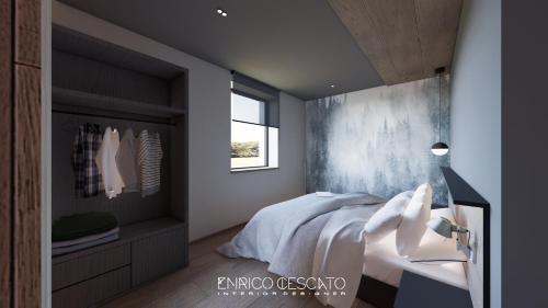 Giường trong phòng chung tại La Dane Zoncolan aparthotel & spa